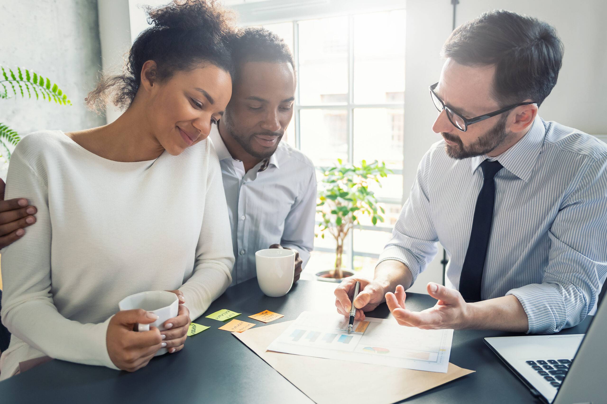 Family Couple Consultations With A Lawyer Or Insurance Agent.